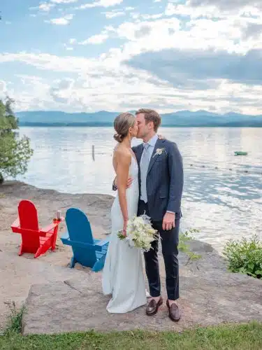 Bride and groom in front of Lake Champlain