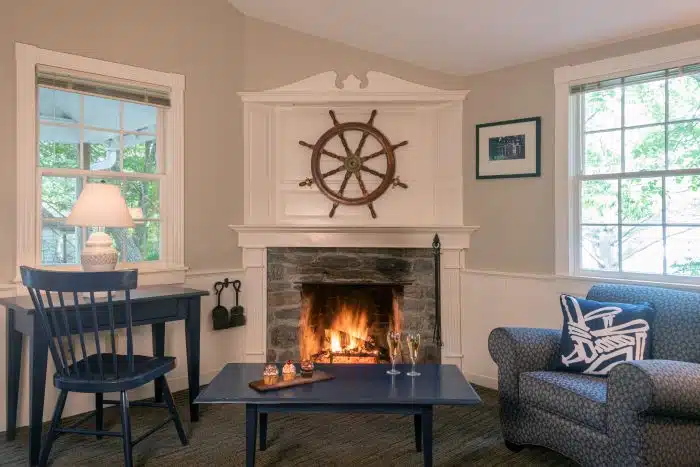 A fireplace in the living room of one of the accommodations