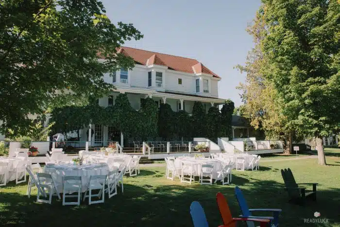 A photo of the main lodge and lodge lawn set up for an event