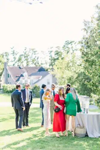 Guests arriving to the ceremony location for a wedding
