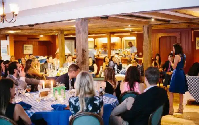 Group sitting and listening to a speaker in the Ranger Room
