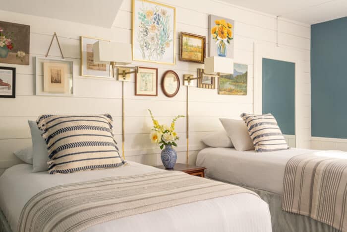 A room with two twin beds in one of the accommodations