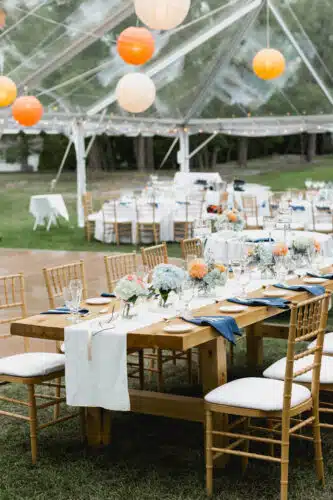 A wedding tent set up for a wedding reception