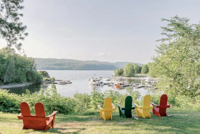 View of the harbor from the Lodge Lawn. Colorful chairs offer a front row seat.