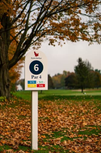 A sign at the golf course