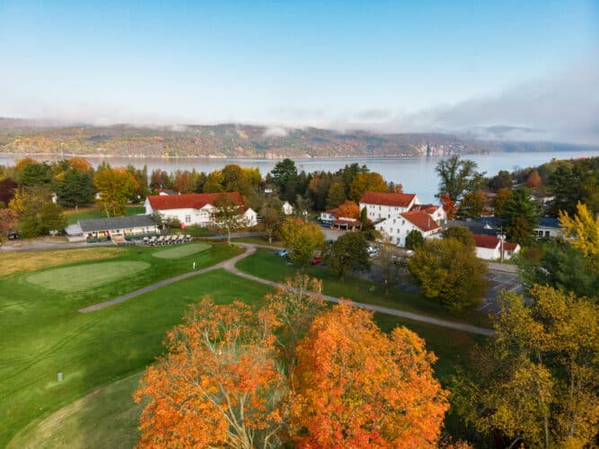 an aerial view of the main lodge during fall